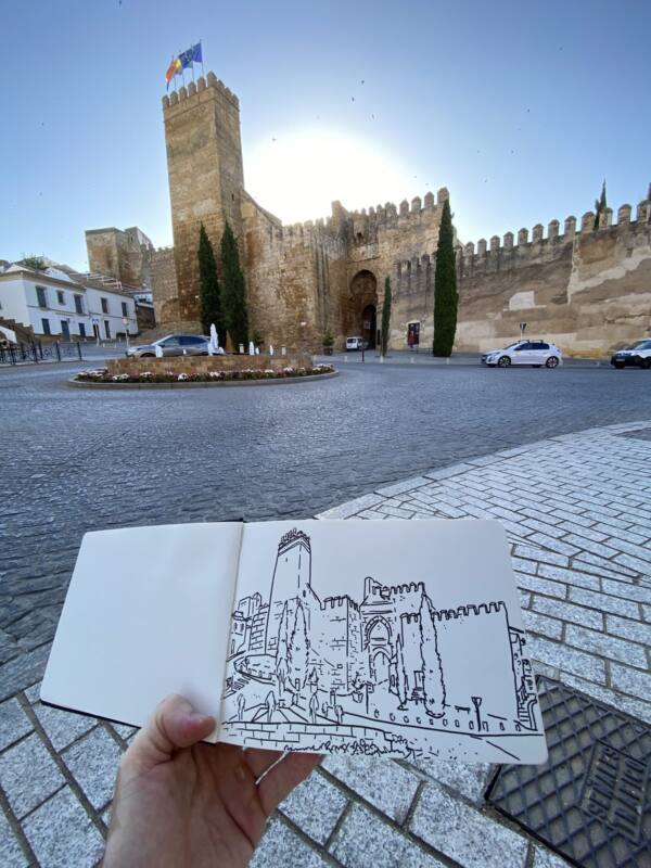 Dibujo a tinta del Alcázar de la Puerta de Sevilla frente al monumento real