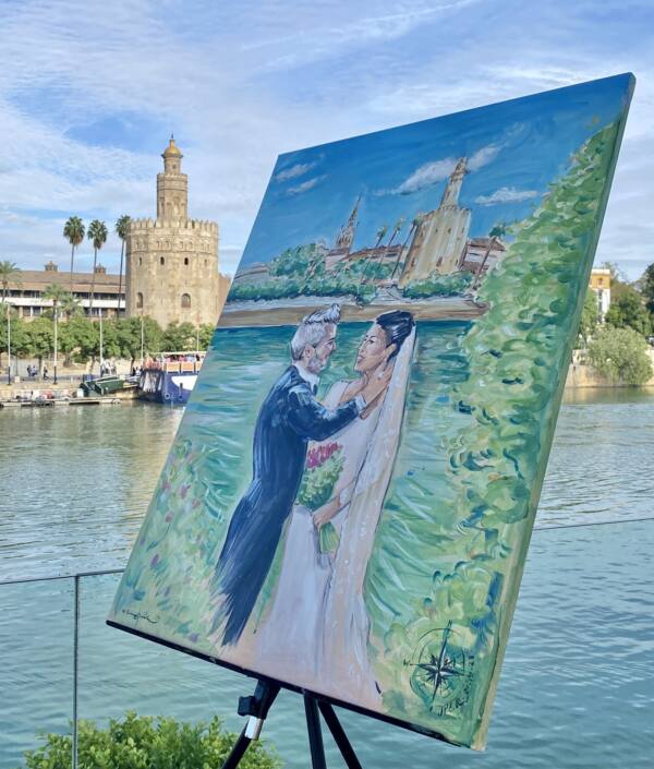 Cuadro de una pareja de novios junto al Guadalquivir y la Torre del Oro, pintado en directo